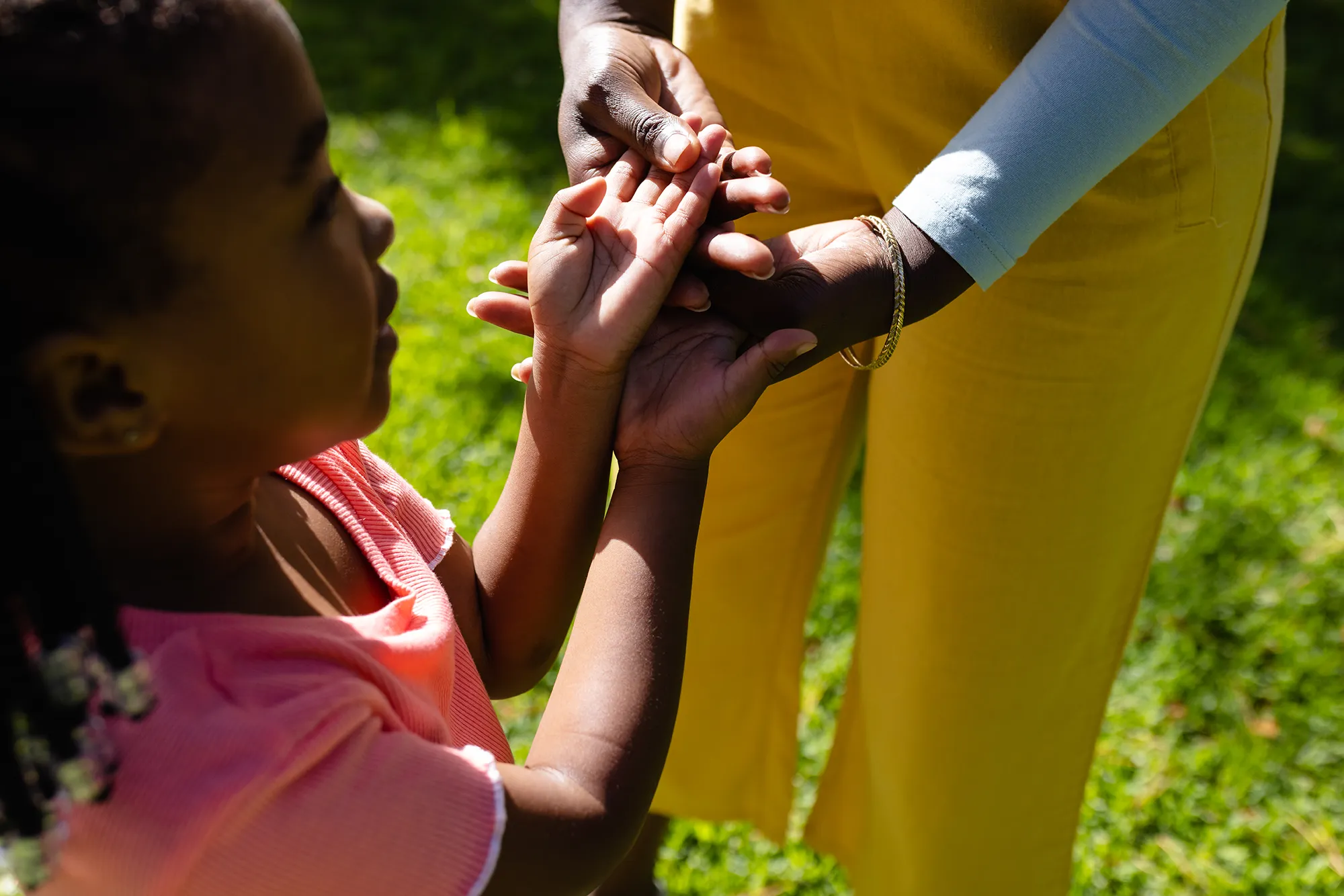 adult-and-child-enjoying-a-moment-outdoors